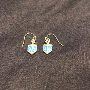 Dreidel earrings, new without box.